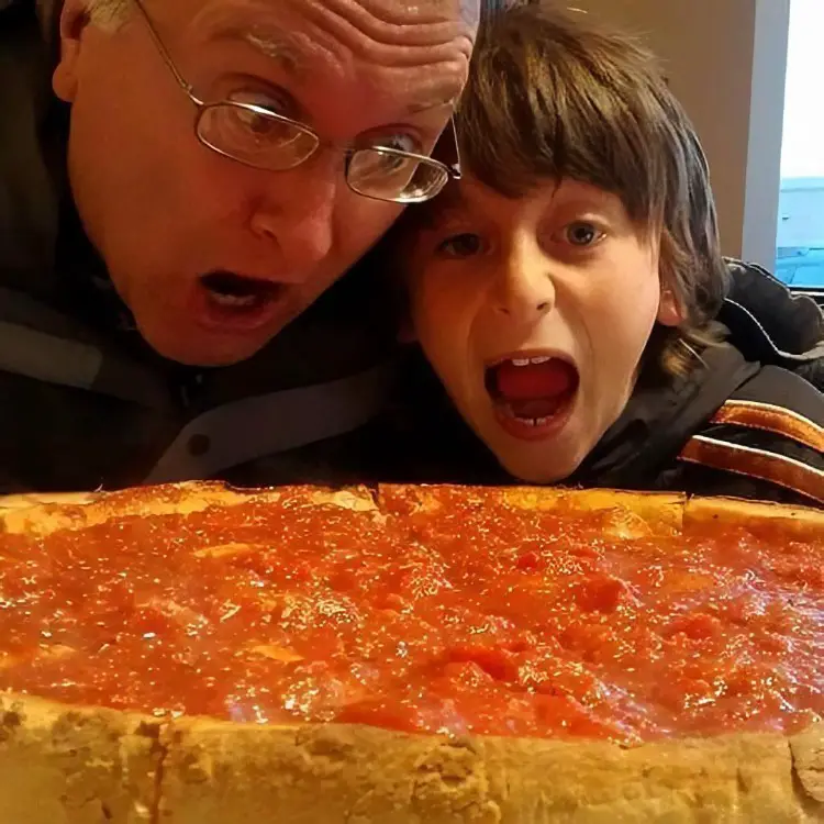 Boy and Grandpa Eat Pizza