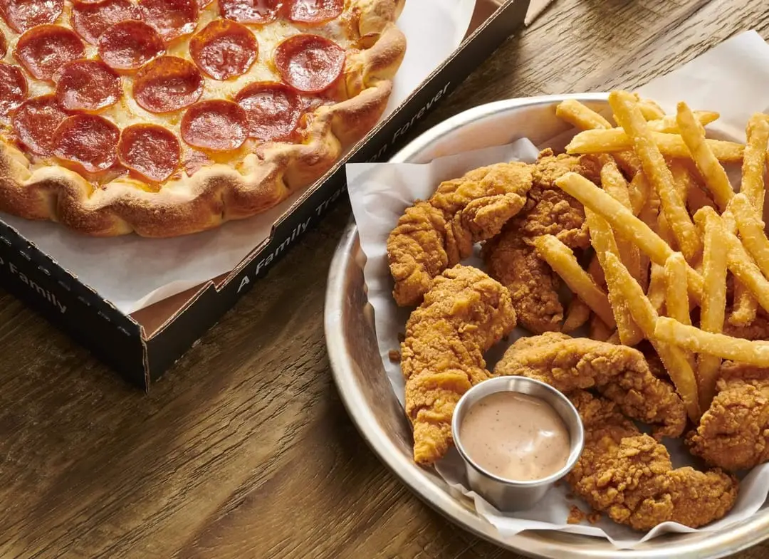 Antonio's Pizza National Eat What You Want Day Get 1 Medium 1-Topping Pizza, 6-Chicken Tenders with Fries for $23.99