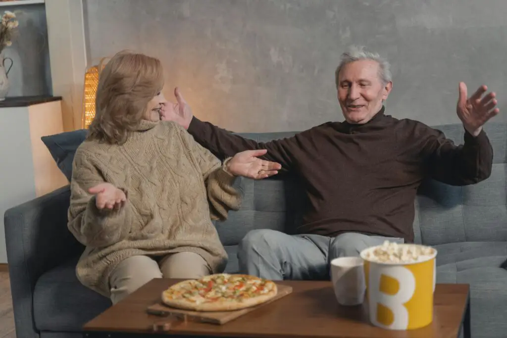 Old husband and wife eating best gluten-free pizza